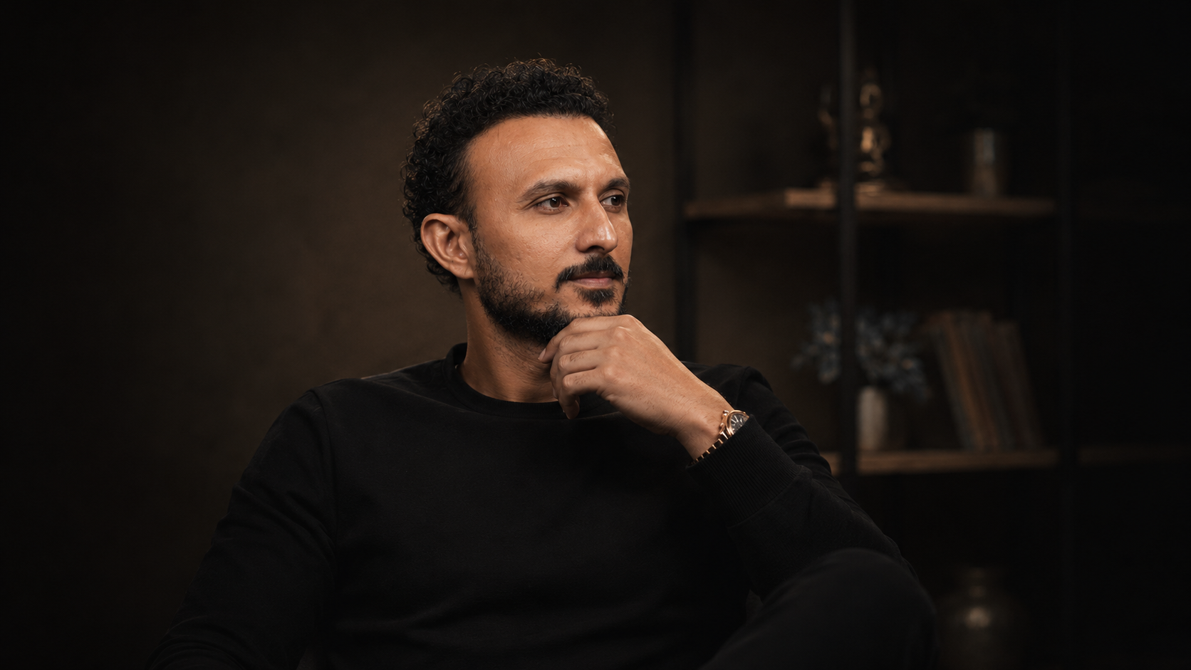 Paras Dhakan reflecting in a warm studio setting